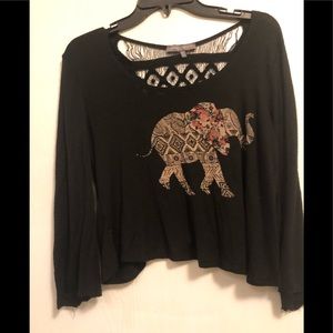 Cute shirt in black with lace in back,distressed.